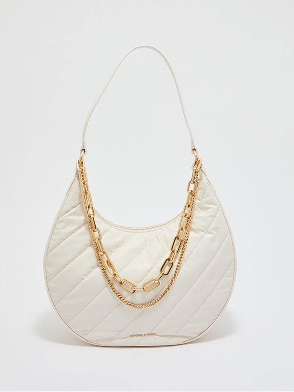 Charles & Keith Cream Quilted Crescent Bag with Gold Chains